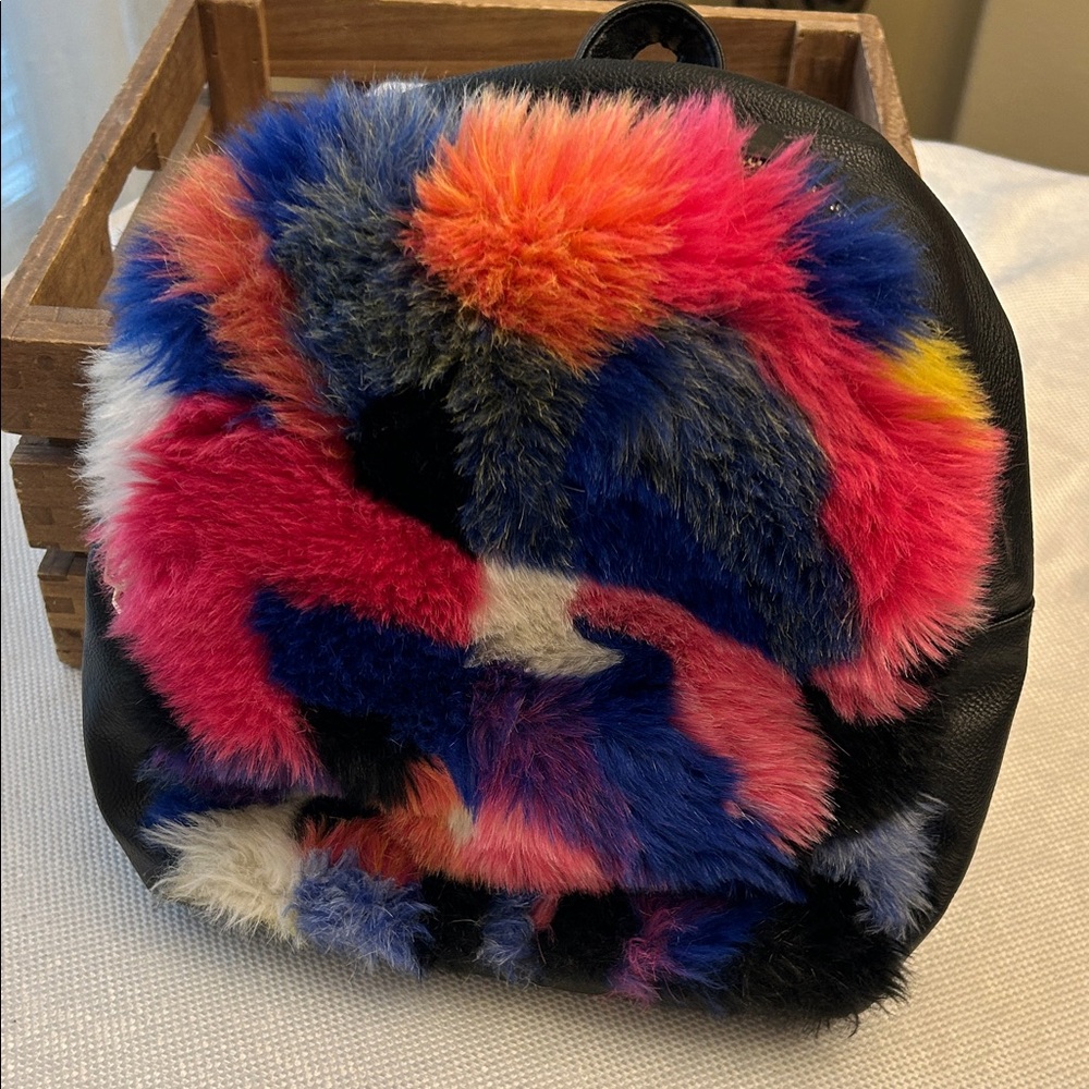 Charlotte Russe Multi-Colored Faux Fur backpack black base & adjustable straps.